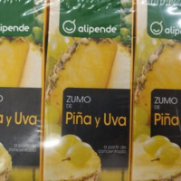 Zumo de piña y uva