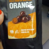 Boules from Fruit Orange enrobée from Chocolate Black Boules from Fruit Orange enrobée from Chocolate Black